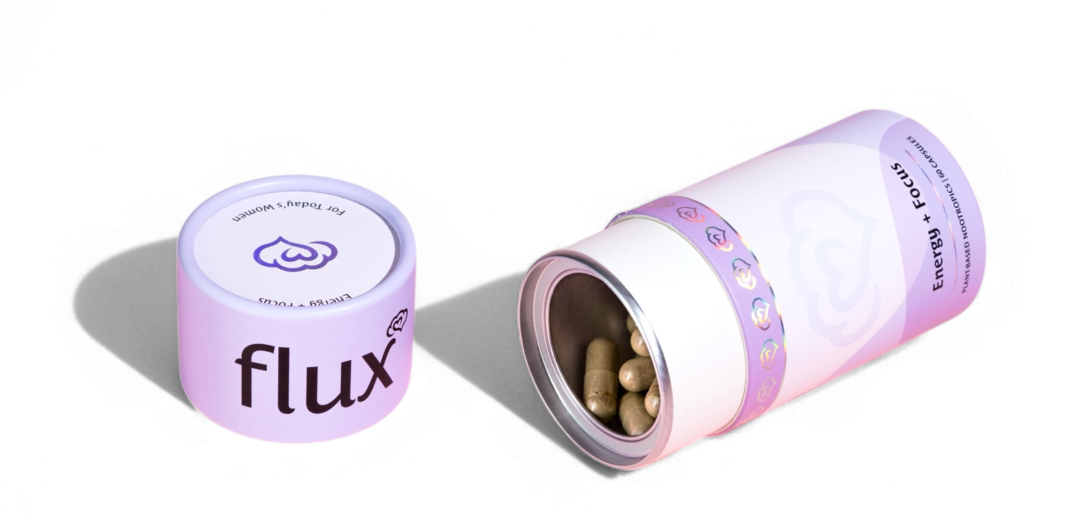 woman holding nootropics packaging